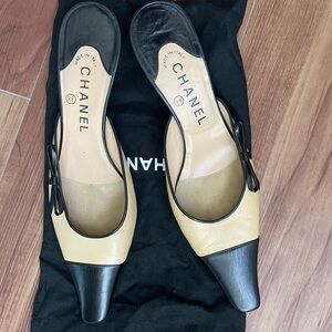 CHANEL Women's Black and Cream Leather Mules - Never Worn